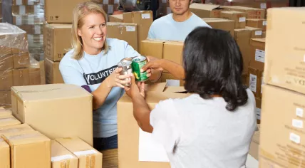 Volunteers sorting food bank donations