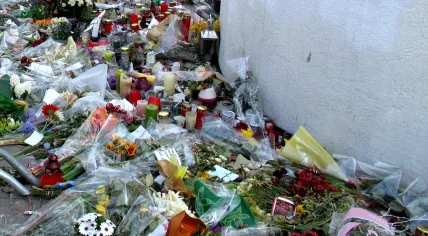 A sea of flowers left at the Ridderhof shopping center in in Alphen aan de Rijn after a mass shooting left six people dead and 16 injured on 9 April 2011