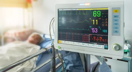 Screen showing an elderly patient's vitals in hospital