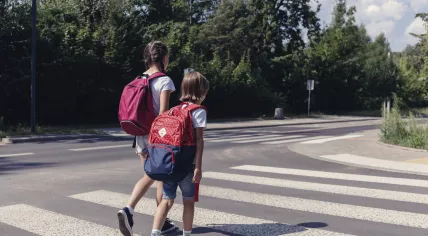 School kids crossing the street