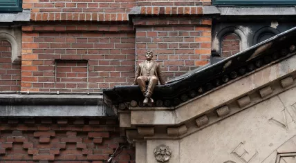 Statue of Eberhard van der Laan on music venue Paradiso in Amsterdam, made by artist Frankey
