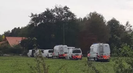 Police at a farm on Buitenhuizerweg in Ruinerwold, where a family was found living in seclusion for nine years, 15 Oct 2019