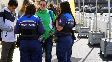 Enforcement officers speaking to passersby in Rotterdam