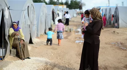 Women and children in a refugee camp
