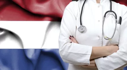 A doctor with the Dutch flag