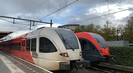 Two Qbuzz trains at Dordrecht station