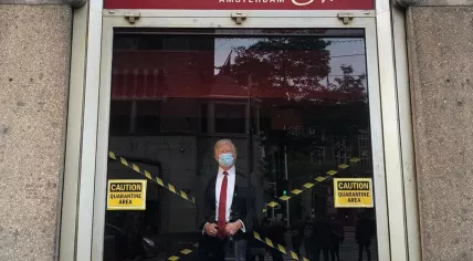 Wax statue of Donald Trump in a face mask at Madame Tussauds in Amsterdam