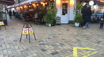 Customers get a last drink and meal at Bar Basquiat in Amsterdam Oost hours before the partial lockdown went into effect. 14 October 2020