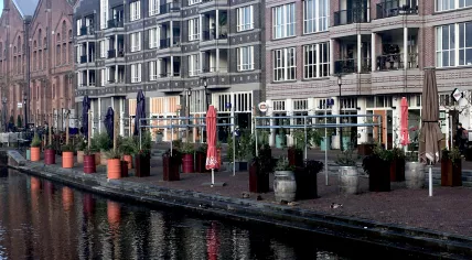 The empty terraces of cafes and restaurants at the Amsterdam Oostpoort shopping center during the second wave of coronavirus infections. 28 October 2020