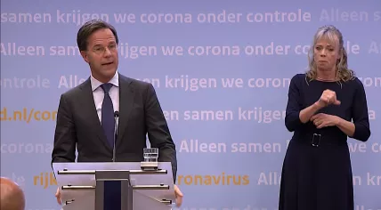 Mark Rutte discussing new coronavirus restrictions at a press conference. 13 October 2020