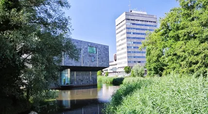 On the left is the Van Abbe Museum at the end of Stratumseind in Eindhoven. It sits across the water from the city hall complex on the right side of the photo
