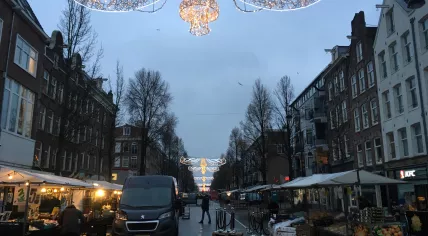Market stalls being set up on the Dappermarkt in Amsterdam Oost. 18 Dec. 2020