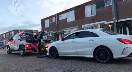 Police found a car in one of the raided houses