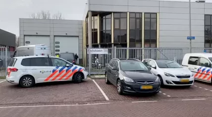 Police at an ABN Amro mail sorting center on Bolstoen in Amsterdam where a mail bomb exploded on 12 February 2020
