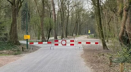 A gate blocking access to a parking location at the dunes in Soest.