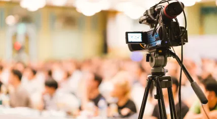Camera focused on a studio audience