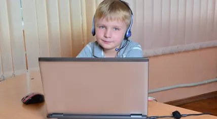 Child using a laptop