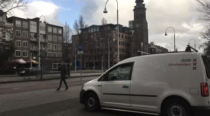 A truck from municipal health service GGD Amsterdam