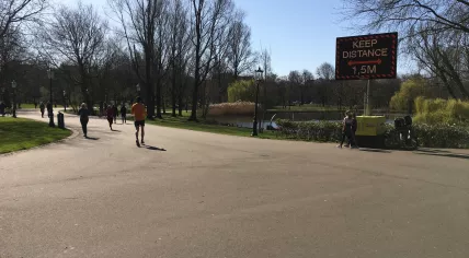 Covid-19: Sign in Amsterdam's Oosterpark instructing people to stay 1.5 meters apart