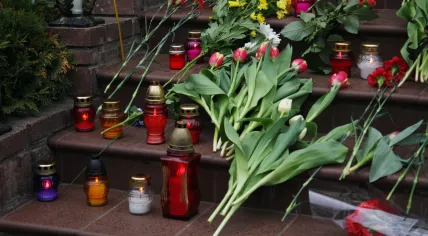 Condolence candles and flowers