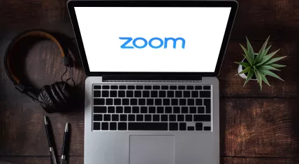 Laptop opening the Zoom app. March 30, 2020