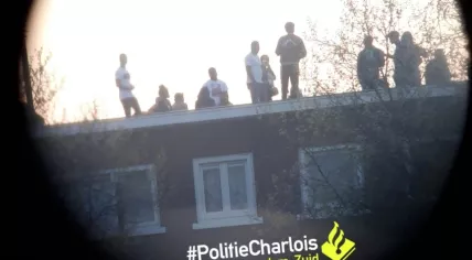 17 people caught barbecuing on a roof in Rotterdam-Carlois, despite coronavirus social distancing measures, 12 April 2020