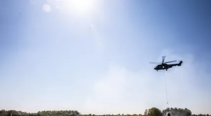 Chinook helicopters from the Ministry of Defense helping to fight a fire in National Park De Meinweg near Herkenbosch in Limburg, 23 April 2020