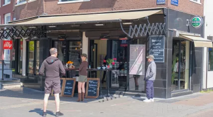 Covid-19: Amsterdam residents maintaining social distancing as they wait for their takeaways, 27 April 2020