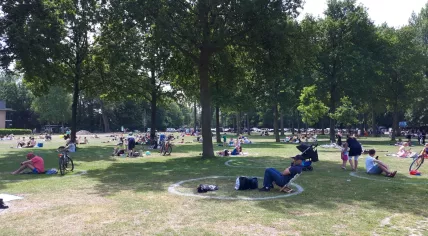 A Rotterdam park encouraged social distancing with circles spray-painted on the grass.