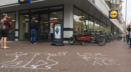"Love is for all" written outside a Lidl store in Amsterdam where a gay couple was verbally attacked on 18 April 2020