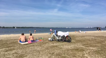 Sun seekers largely social distancing on Almere Strand, 21 May 2020