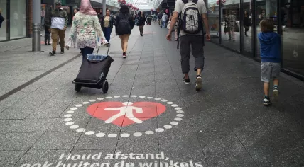Social distancing reminders at the Boven ‘t IJ shopping center in Amsterdam Noord.