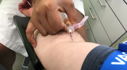 A patient being screened for Covid-19 antibodies at a Dutch hospital