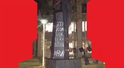 “No Racism; No Tribute” spray painted on the Pim Fortuyn statue in Rotterdam, 12 June 2020
