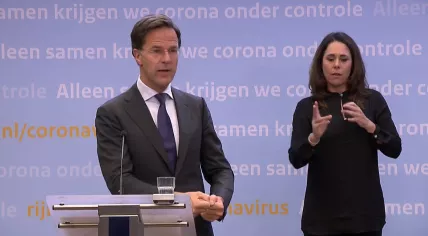 Mark Rutte and Sing language interpreter Irma Sluis