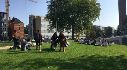 Students gather outside at the University of Amsterdam's Roeterseiland campus. Sept. 16, 2020