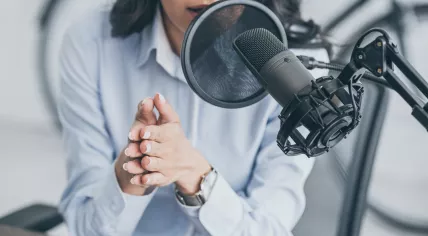 Woman presenting podcast