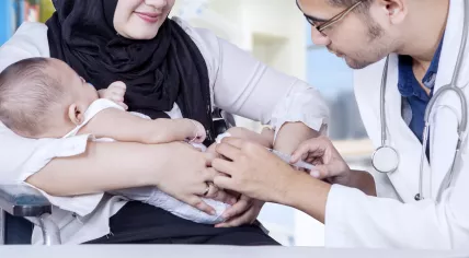 Vaccine being given to baby