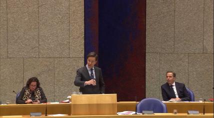 Prime Minister Mark Rutte, with Health Ministers Tamara van Ark and Hugo de Jonge behind him, during a parliamentary debate on the Covid-19 vaccination policy, 5 January 2021