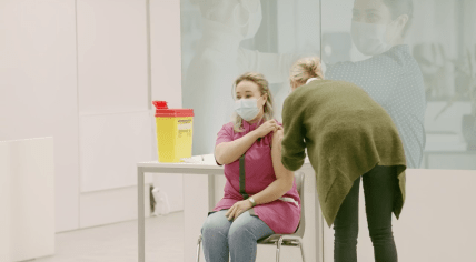 Nursing home worker Sanna Elkadiri getting the first Covid-19 vaccine in the Netherlands, 6 January 2021