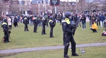 Riot police at an illegal demonstration on the Museumplein in Amsterdam, 24 January 2021