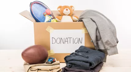 Donation box with toys and clothing
