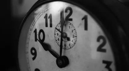 A vintage alarm clock just past 10 p.m.