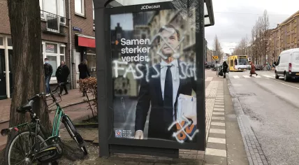 A VVD campaign poster defaced with swastikas in Amsterdam Oost. 12 March 2021
