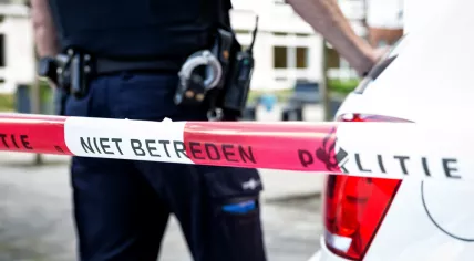 A Dutch police officer at a crime scene.