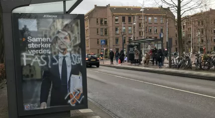A poster of Prime Minister and VVD leader Mark Rutte defaced with swastikas at two bus stops in Amsterdam. 12 March 2021