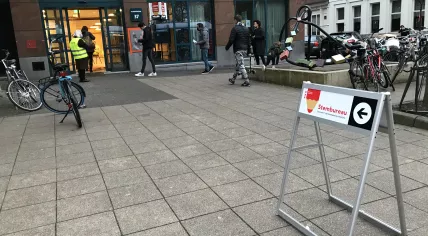 Voters line up outside the Protestant Church in Amsterdam Oost to cast a ballot in the evening of 17 March 2021