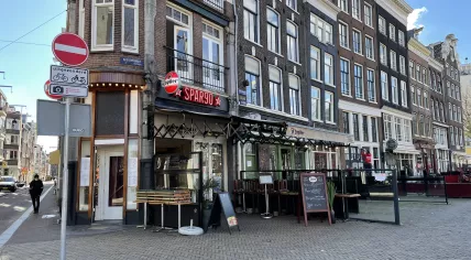 Spargo, only open for takeaway during the coronavirus lockdown, alongside Cafe Cuba, and Cotton Club, in Amsterdam's Nieuwmarkt. 19 March 2021