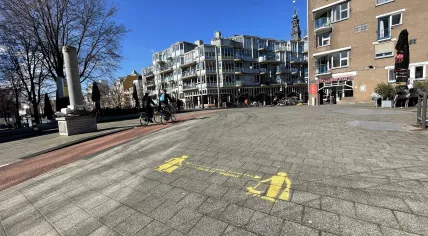 A social distance reminder on Jodenbreestraat in Amsterdam during the coronavirus pandemic and lockdown. 19 March 2021