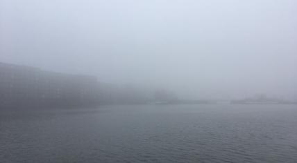 Fog obscures the view of Javaeiland and KNSM-eiland in Amsterdam, 3 March 2021